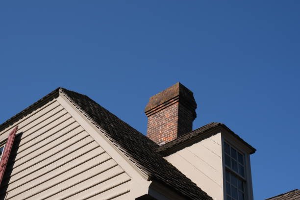 Brick chimney on a residential roof