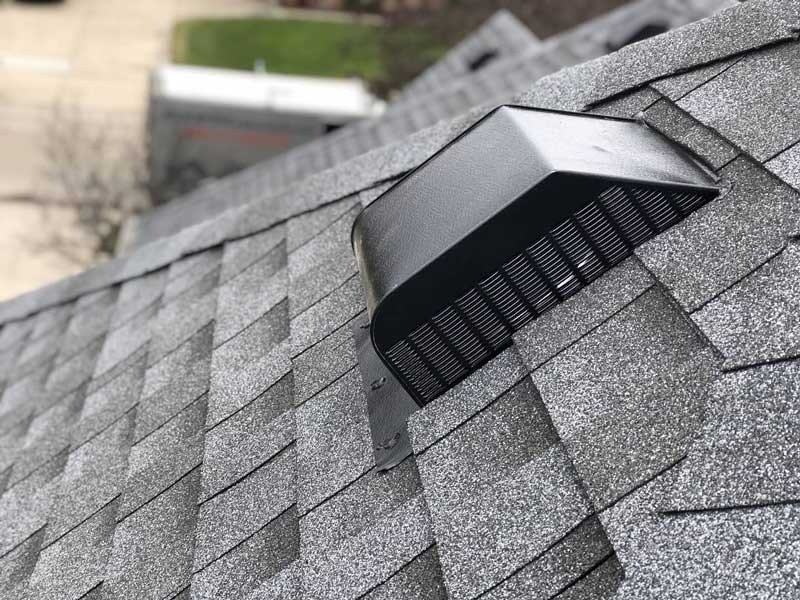 Roof vent installation on asphalt shingle roof